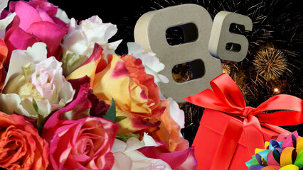Birthday card  in numbers , roses, gift, fireworks light sky. Age is 86