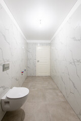 Modern Bathroom Interior with Marble Walls and Minimalist Design