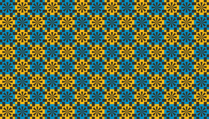 Bright seamless pattern of radial floral shapes in bold yellow and deep blue tones on a black background, forming a vibrant geometric mosaic