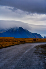Rainy sky with big mountain and snow for travel in Iceland.