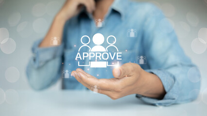 Man holding virtual approve icon with team and employee symbols, representing human resources...