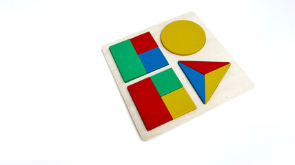 educational puzzle toy made of environmentally friendly wood material. geometric wooden puzzle with colorful color