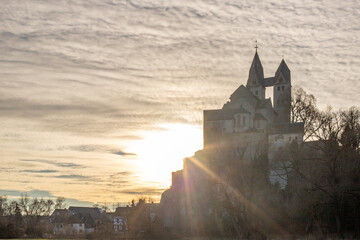 A winter landscape shot at sunrise. Plenty of nature and a large church on a rock. The former...