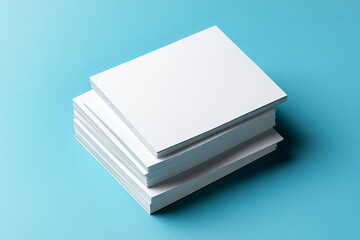 Minimalist blank business cards stack on blue background ready for custom design and branding