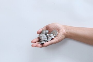 Coins in hand. Saving money. Saving money