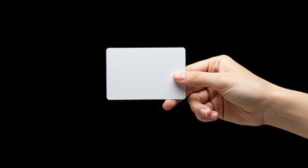Hand presenting blank card against black