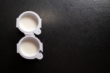 Small milk, coffee creamer pots on red. Mono portions, for catering etc.
Coffee creamer.
Single...