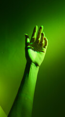 A Hand Reaching Out in a Vibrant Green Light, Symbolizing Connection and Hope in a Lush, Dreamy...