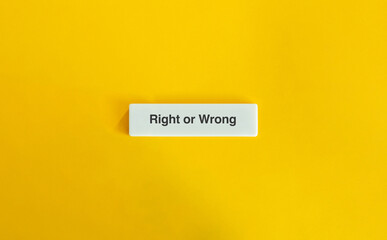 Right or Wrong Text on Minimal Yellow Background with Letter Tile Design. Decision-making, moral...