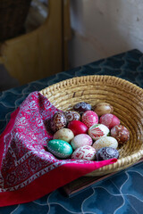 Colorful Easter Eggs in a Wicker Basket