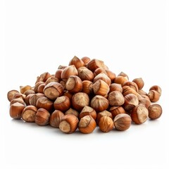 Fototapeta premium Large pile of hazelnuts forming a mound on a white background