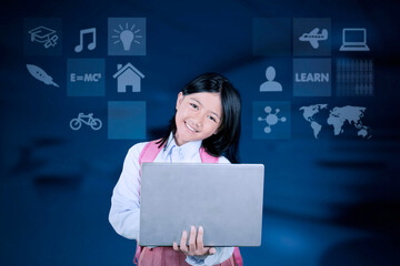 Smiling Asian Schoolgirl Holding Laptop with Educational Icons Background
