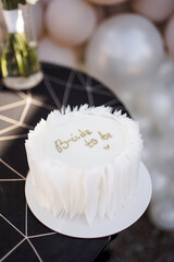 White cake with the inscription 