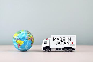 Truck and boxes with the inscription made in Japan.