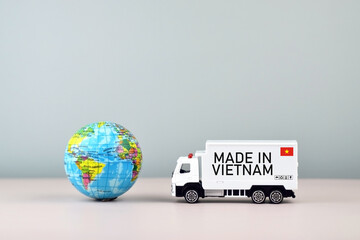 Truck and boxes with the inscription made in Vietnam.