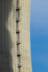 Industrial cooling tower with external staircase