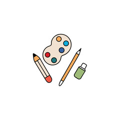 top view of scattered art supplies   brushes  colo