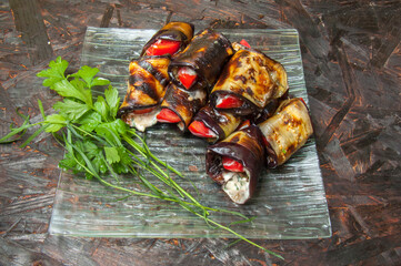 Eggplant Rolls on Clear Plate: Close-up