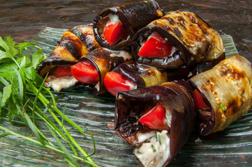 Fried Eggplant with Filling and Fresh Vegetables on Board