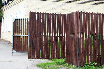 Brown wooden open gate. Retro style.