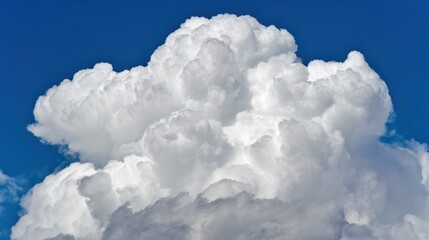 Naklejka premium Tranquil cumulus cloud formation under daylight sky, capturing summer's vast openness