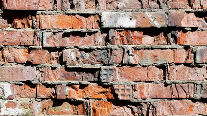 Red wall made of old brick.