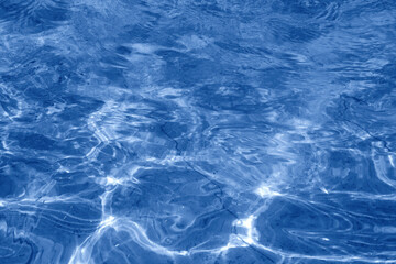 Dark blue water surface texture. Ocean waves background.