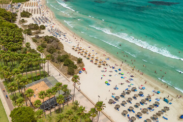 Aerial view of Platja de sa Coma beach in Mallorca, Balearic Islands, Spain.