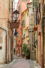 Beautiful narrow street of Menton, a resort town on the French Riviera, France.