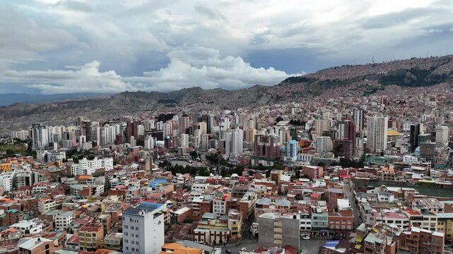 La Paz, Bolivia, aerial view flying over the dense, urban cityscape.
