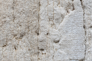 Texture of ancient stone wall showcasing intricate patterns and natural wear