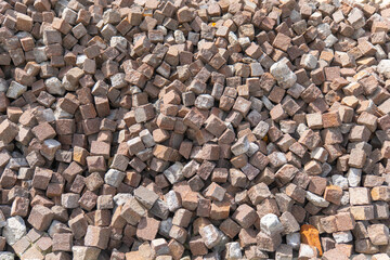 Colorful granite cobblestones ready for a beautiful outdoor pathway