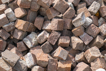 Colorful stone bricks stacked in a construction site ready for use