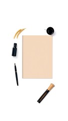 A beige paper is surrounded by wheat, ink, and pens, isolated on white background