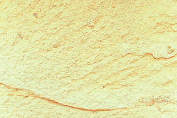 Natural textures create a visual symphony in golden yellow earth layers