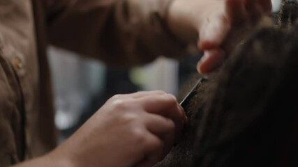 Hair styling focuses on techniques for managing textured hair in salons, ensuring client satisfaction and style