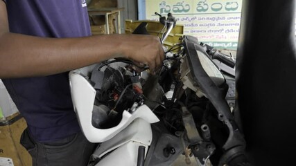 Expert Hand at Work - Troubleshooting Electrical Components