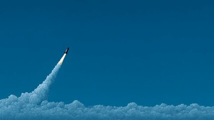 Rocket soars through blue sky leaving a trail of white smoke.