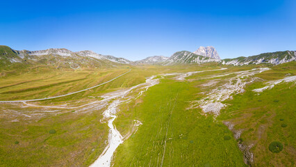 Italy 03 July 2025: aerial view from the drone of the Campo Imperatore plateau in the province of L'Aquila in Abruzzo. Also called Little Tibet, here you can breathe peace and quiet 