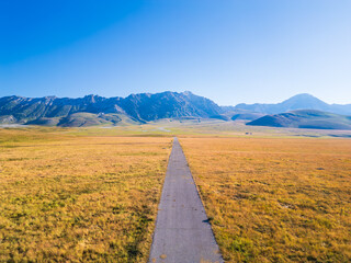 Italy 03 July 2025: aerial view from the drone of the Campo Imperatore plateau in the province of L'Aquila in Abruzzo. Also called Little Tibet, here you can breathe peace and quiet 
