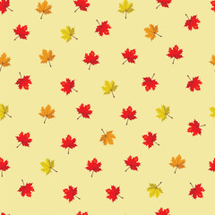seamless pattern with autumn maple leaves of different colors on a light background