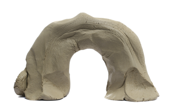 Clay modelling in shape semi-arch, isolated on white