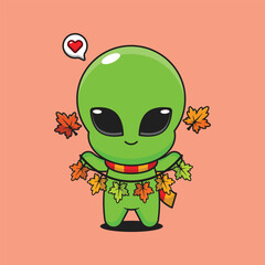 Cute alien holding autumn leaf decoration in autumn day cartoon vector illustration