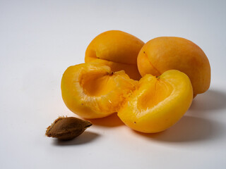 Sweet cherries with apricots isolated on white background cutout. Ripe berries closeup. Mix berries and fruits.