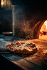 Delicious pizza being pulled makes me crave slice wood fired oven heats it