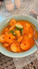 A Culinary Journey to Spain: Gambas al Ajillo, Garlic Shrimp, Skillfully Sauteed in Olive Oil, Garlic Cloves, and Red Chili Peppers, a Taste of Authentic Spanish Seafood Gastronomy.