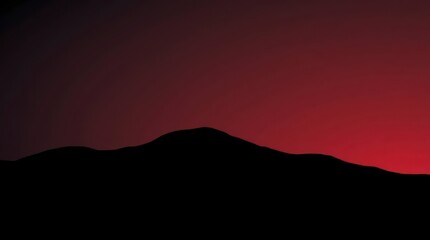 Mountains Silhouette Against Red Sky