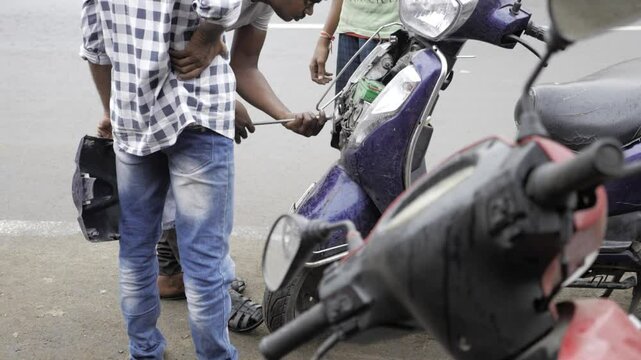 Fixing a Scooter - Urban Streetside Repair