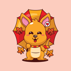 Cute kangaroo holding umbrella in autumn day cartoon vector illustration