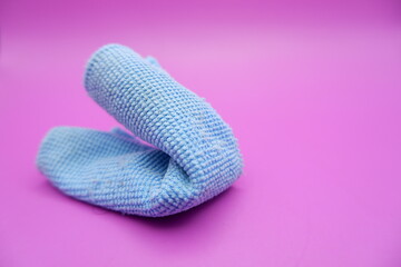 Blue Microfiber Cleaning Cloth on Pink Background